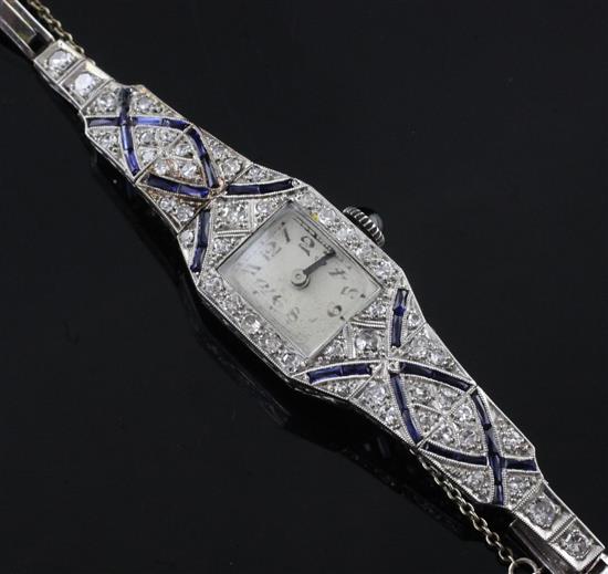 A ladys 1920s platinum, synthetic? sapphire and diamond set manual wind cocktail watch,